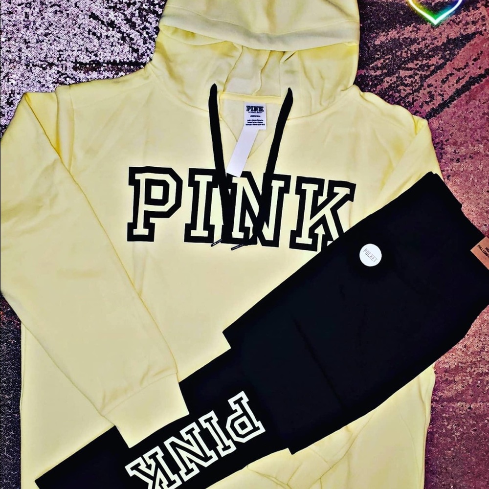 Yellow pullover with yellow logo leggings